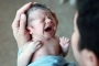 কেন জন্মের পর শিশুরা কাঁদে?